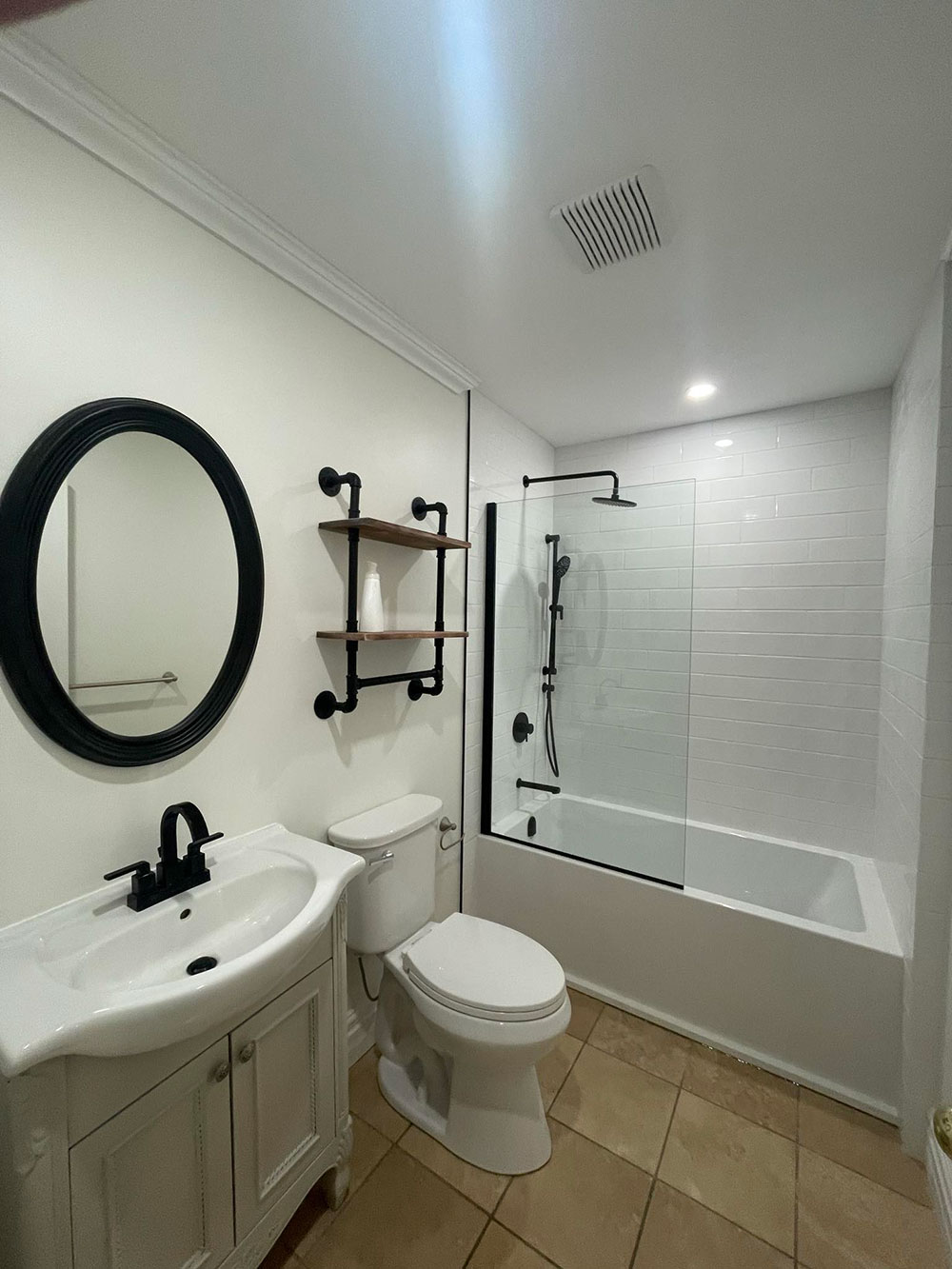elegant looking bathroom with black fixtures